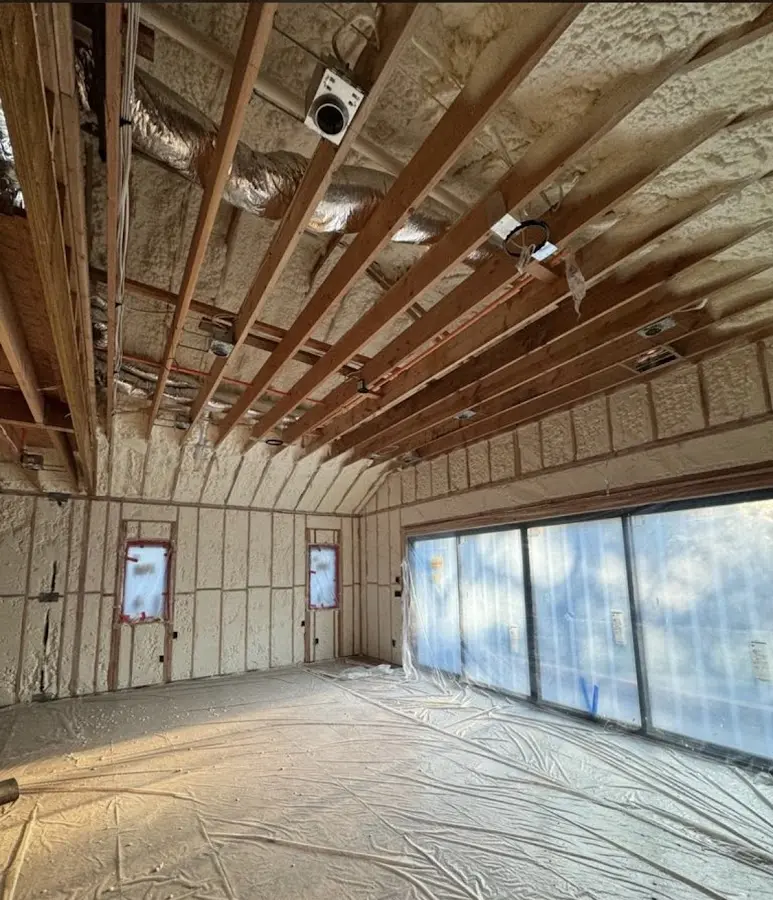 Interior walls and ceiling insulated with spray foam during new construction in Emerson